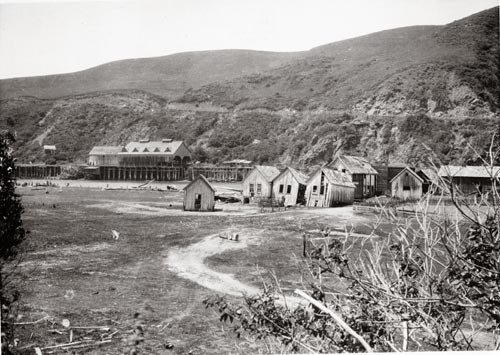 workers cabins after quake and flood